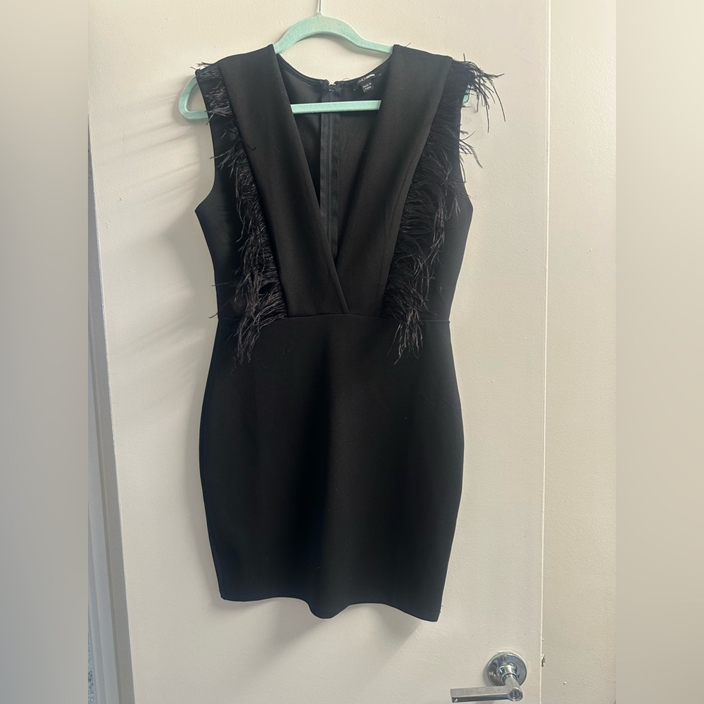 Black Dress with feathers that’s deep v. size large